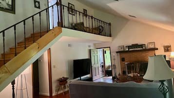 Smart TV, fireplace, DVD player, books