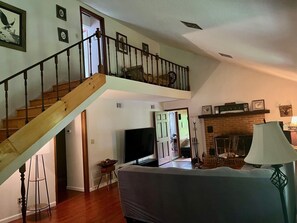 Smart TV, fireplace, DVD player, books