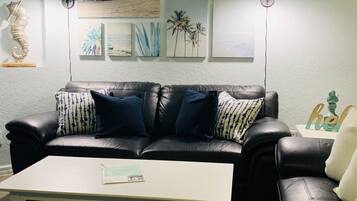 Flat-screen TV, DVD player, video library