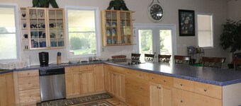 Relax at the Lake in This Beautiful Water Front Home!