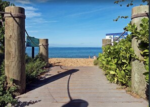 On the beach, sun-loungers, beach towels