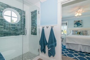 Combined shower/tub, hair dryer, towels, soap