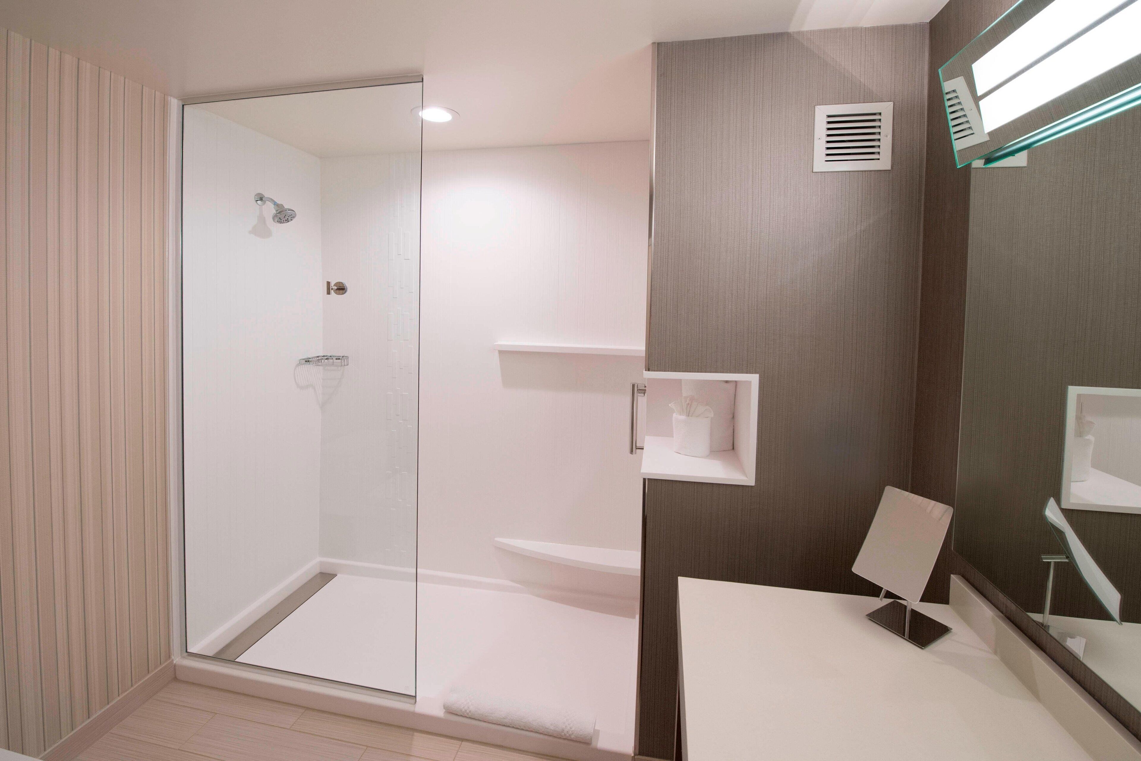 shower, free toiletries, hair dryer, towels