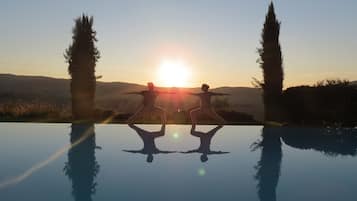 Seasonal outdoor pool, open 9:00 AM to 7:00 PM, sun loungers