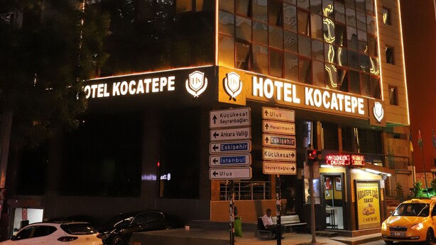 A modern hotel with a glass facade, signage for 'HOTEL KOCATEPE', and a visible entrance. - Kocatepe Hotel (Ankara)