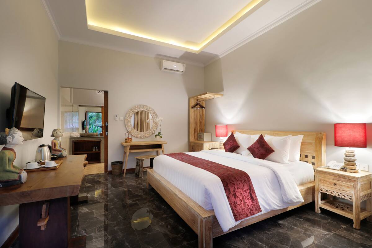 Habitación Deluxe, 1 cama de matrimonio grande, vistas al jardín | 1 dormitorio, sábanas de algodón egipcio, ropa de cama de alta calidad