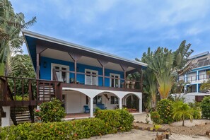 Exterior - Beachfront home w/ ocean view, shared dock/hammocks, partial AC & strong WiFi (Placencia)