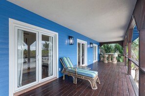 Terrace/patio - Beachfront home w/ ocean view, shared dock/hammocks, partial AC & strong WiFi (Placencia)