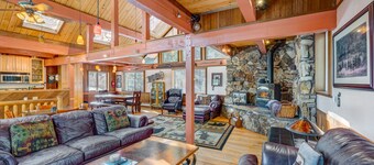 Dog-friendly cabin with private hot tub, fireplace, near skiing & the beach