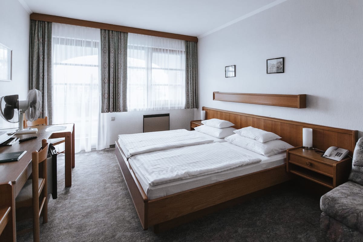 in-room safe, desk, blackout curtains, rollaway beds