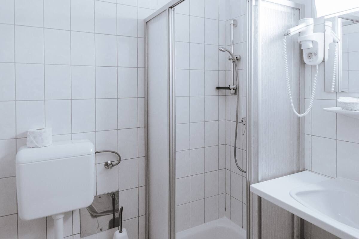 double room | bathroom | shower, hair dryer, towels, soap