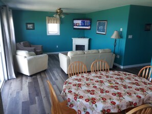 Cottage #5 (Three Bedroom) | Living area | TV, MP3 dock