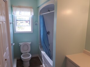 Family Cottage | Bathroom | Rainfall showerhead, free toiletries, hair dryer, towels - John B's Oceanfront Cottages (Grand Tracadie)