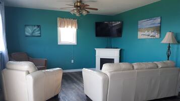 Cottage #5 (Three Bedroom) | Living area | TV, MP3 dock