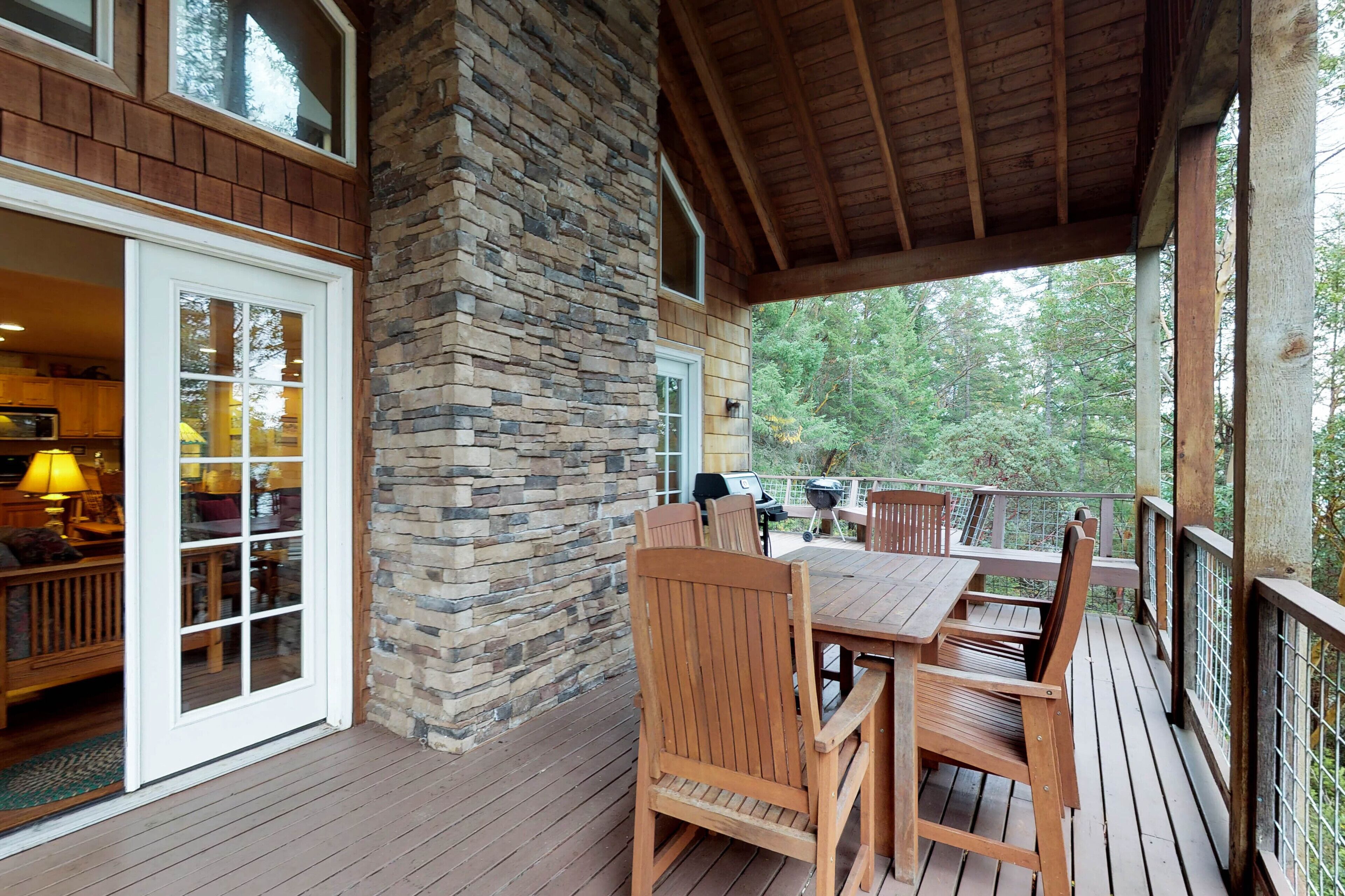 Dog-friendly beach house with furnished deck, island views, & kayaking