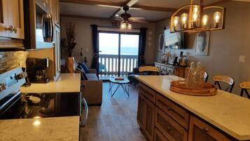 Coffee/tea maker, fridge, microwave, oven