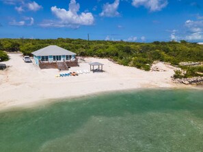 On the beach, sun loungers, beach towels