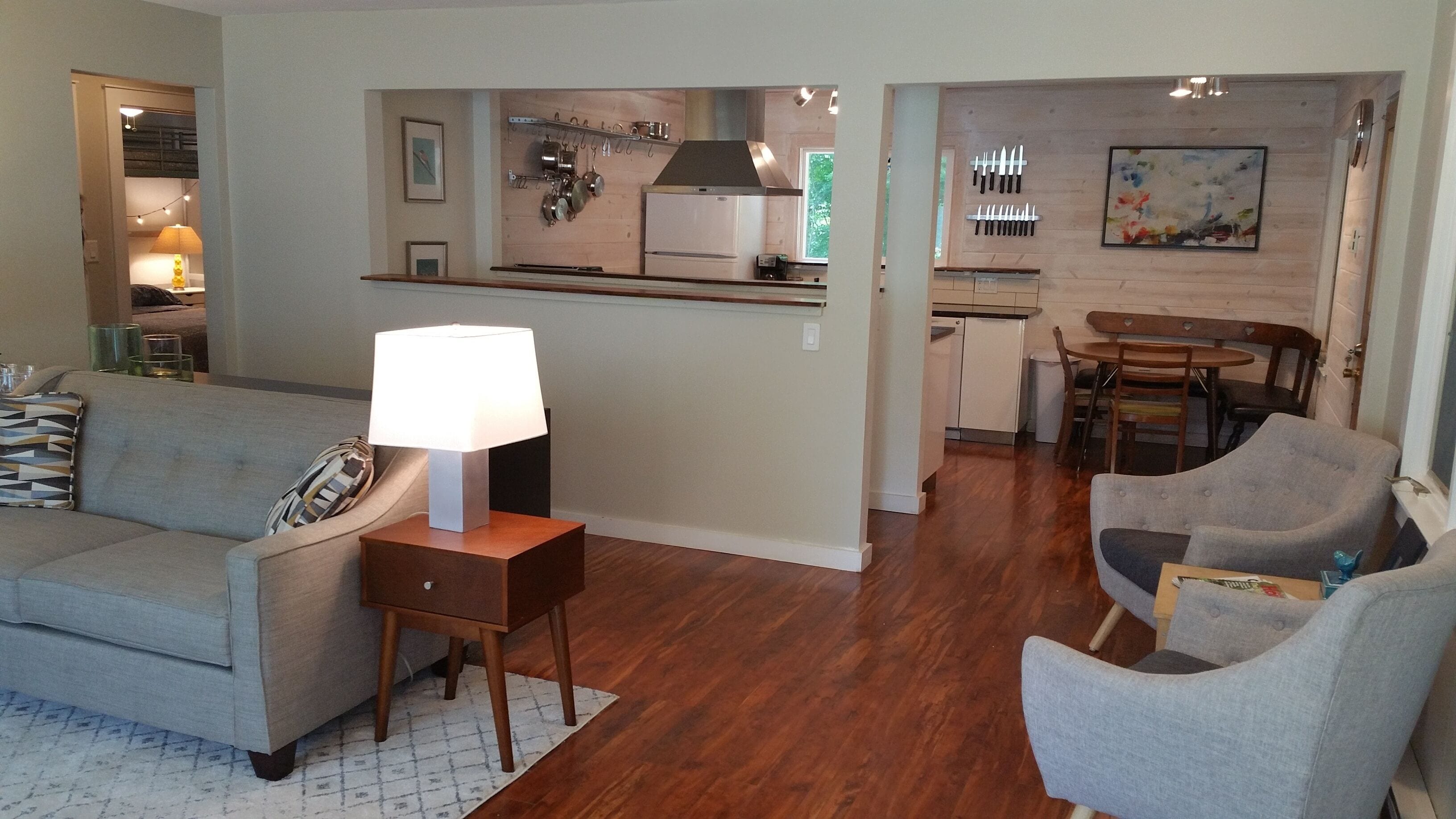 Flat-screen TV, fireplace, books