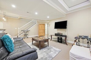 Smart TV, fireplace, video games, foosball