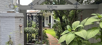 Private separate guest cottage. Beautifully landscaped gated courtyard setting.