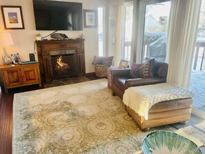 Smart TV, fireplace, books
