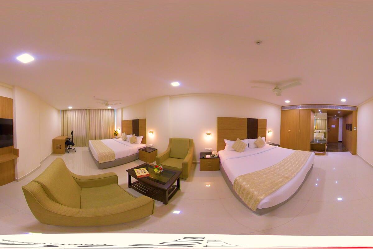 premium room, multiple beds, city view | in-room safe, individually furnished, soundproofing, iron/ironing board