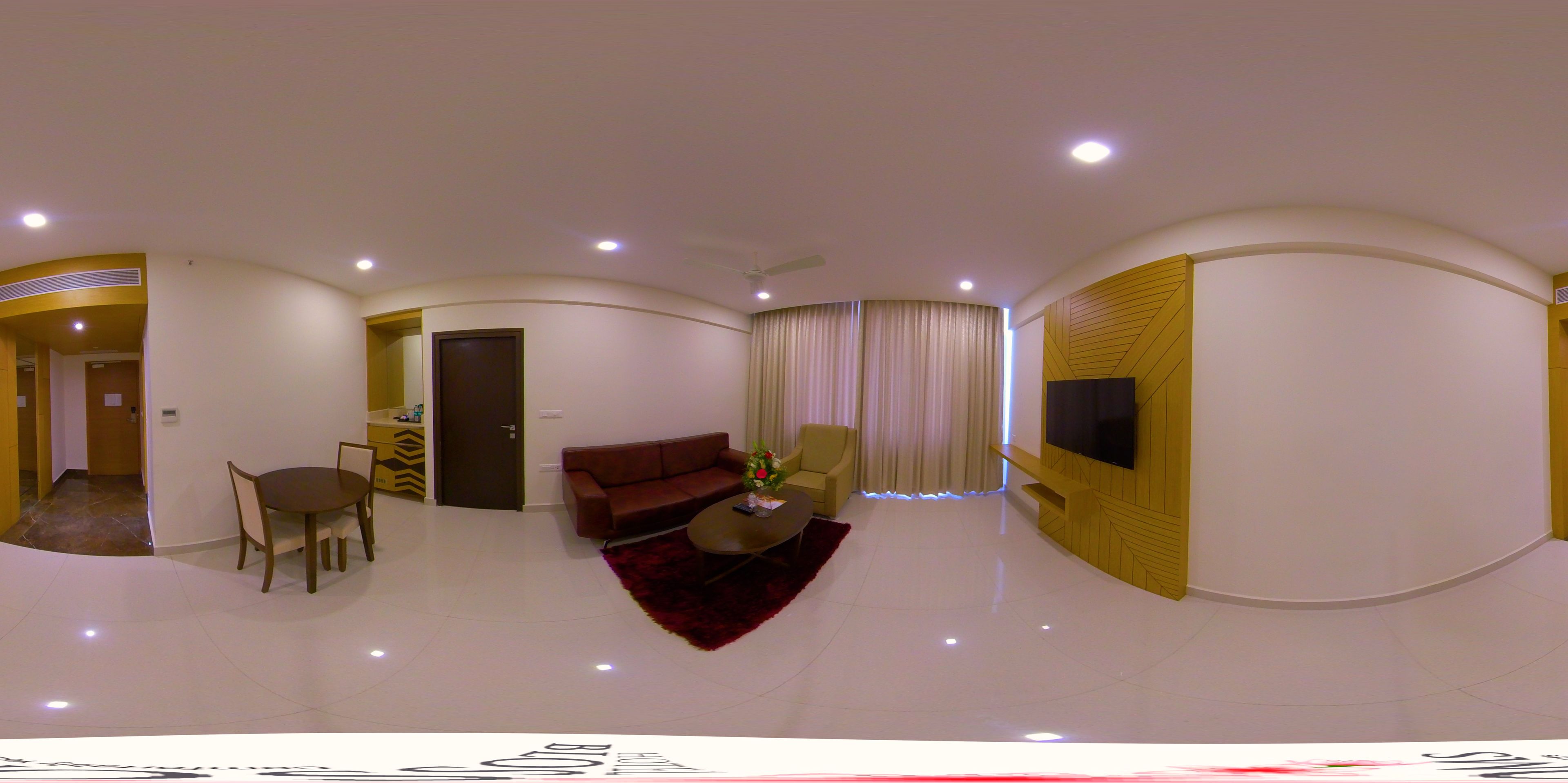 executive suite, 1 king bed, 2 bathrooms, city view | living room | led tv, fireplace