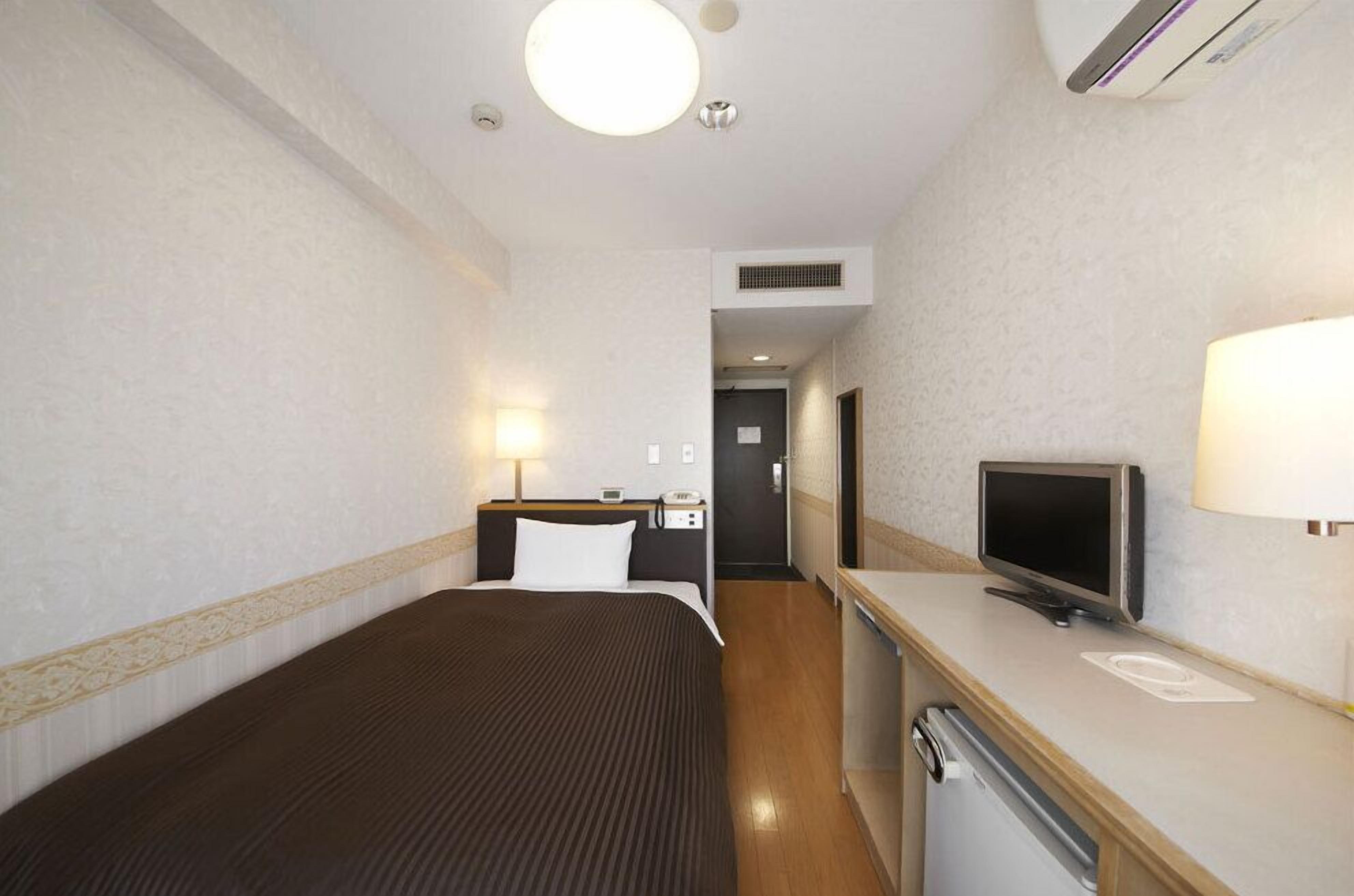 Blackout curtains, iron/ironing board, free WiFi, bed sheets