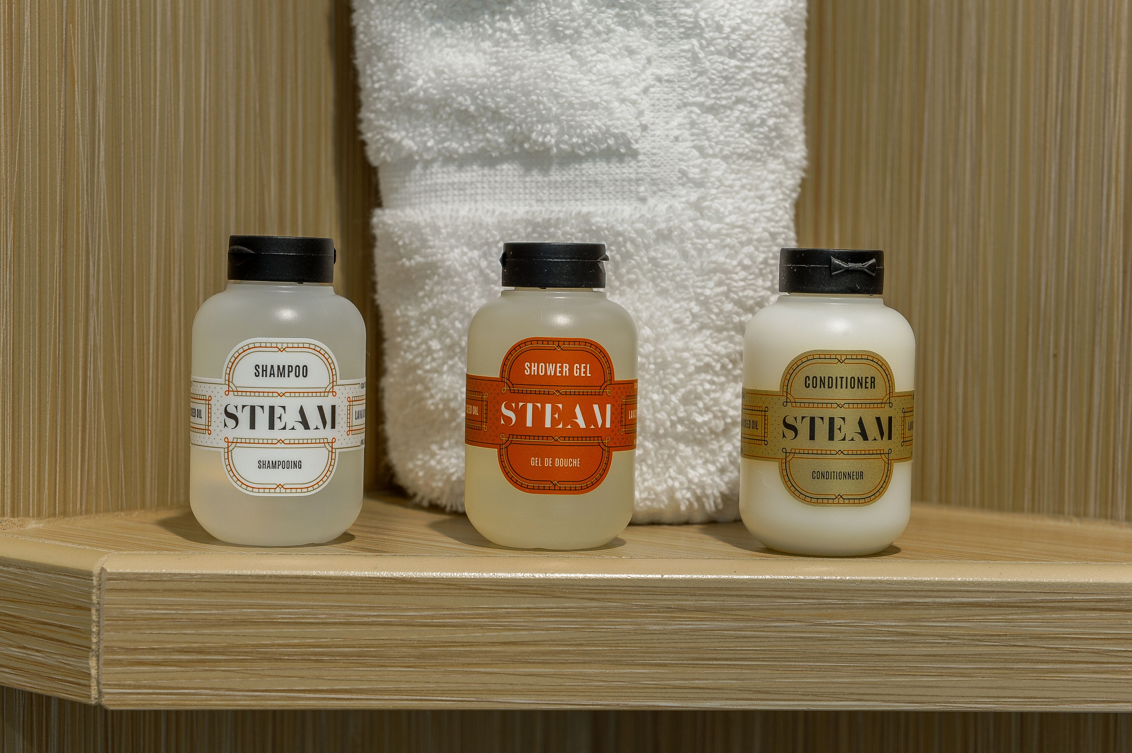 shower, bathrobes, slippers, towels