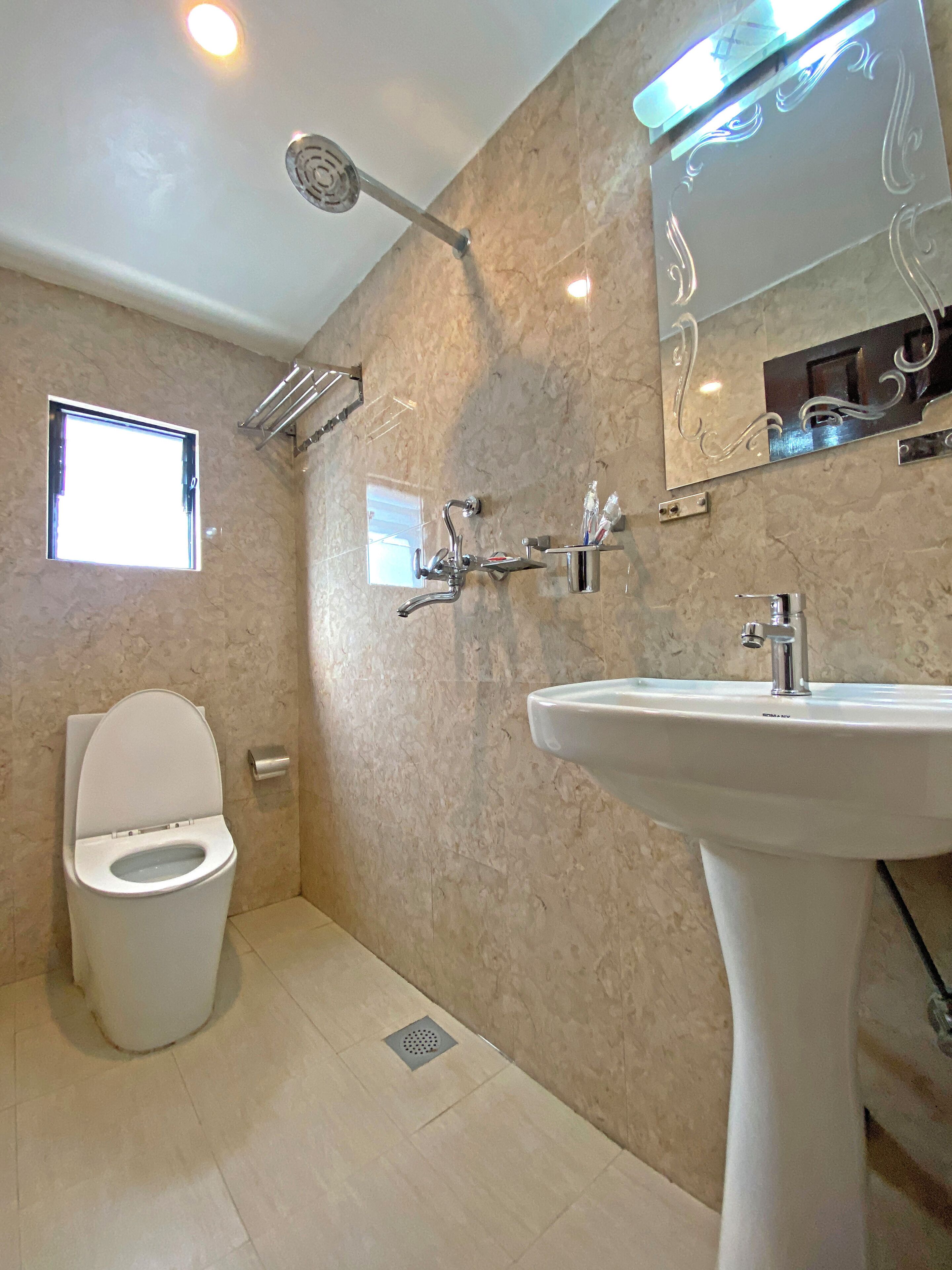 Deluxe Triple Room, City View | Bathroom | Shower, free toiletries, towels, soap