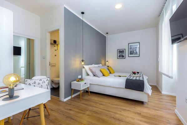 Departamento Deluxe, 1 cama Queen size y sofá cama, para no fumadores, cocineta | 1 habitación, ropa de cama de alta calidad y edredón 