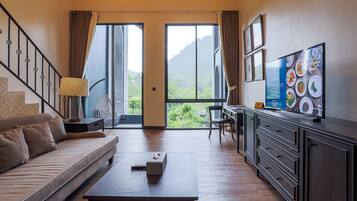 Duplex Room | Minibar, in-room safe, desk, blackout drapes