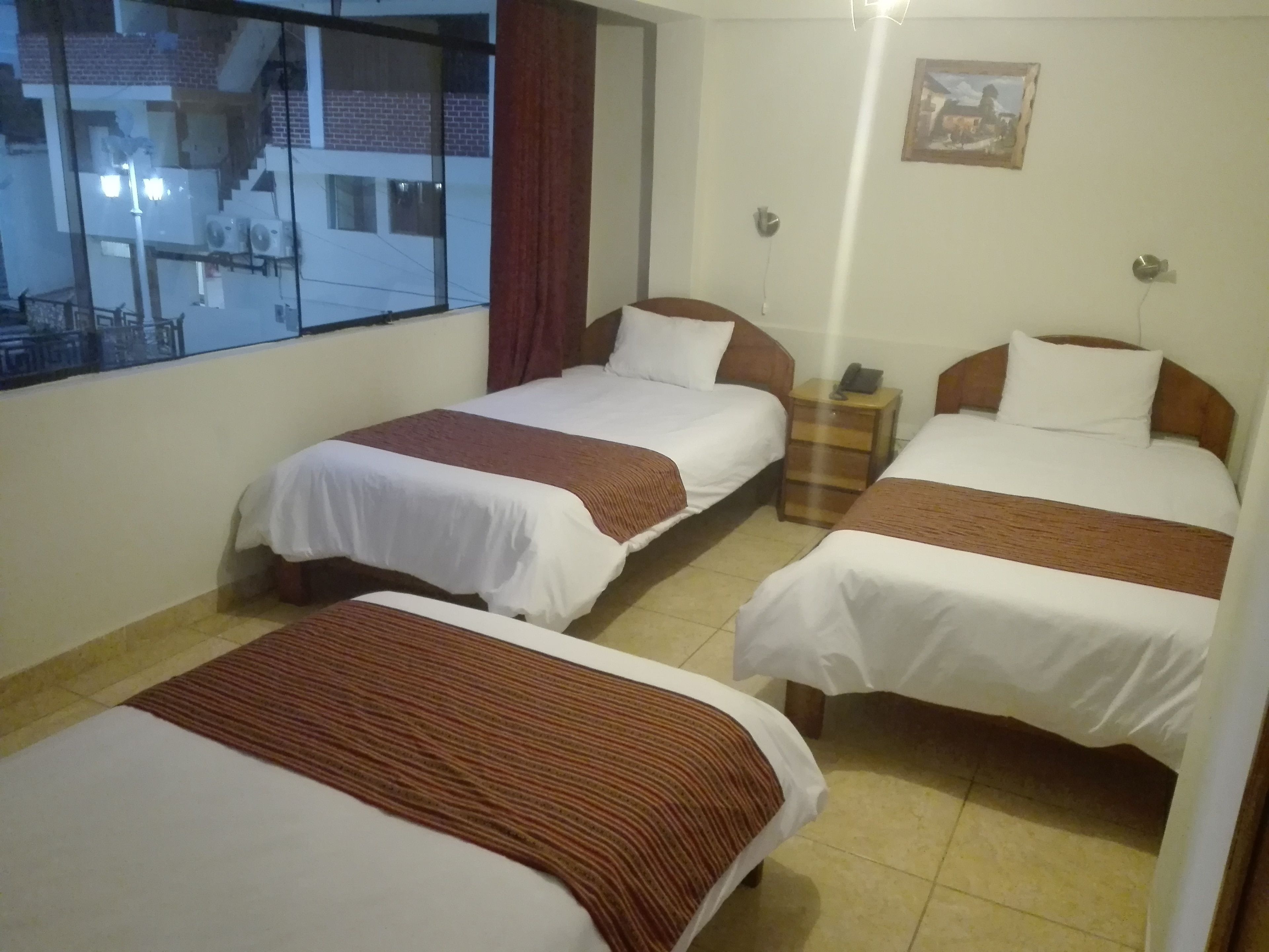 economy triple room, 3 single beds, non smoking, park view | egyptian cotton sheets, premium bedding, down duvets, iron/ironing board