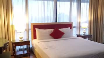 Apartamento família, 2 quartos | Roupas de cama premium, camas Select Comfort, cofres nos quartos