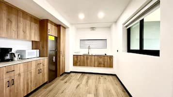 Luxury Quadruple Room, Sea View | Private kitchen | Full-size fridge, microwave, toaster, rice cooker