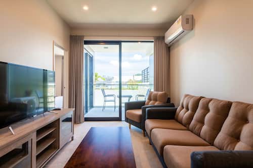 Standard Two Bedroom Suite with a free secure parking | Living room | 51-inch Smart TV with digital channels