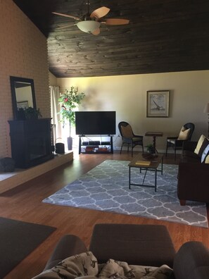 Smart TV, fireplace, DVD player, books