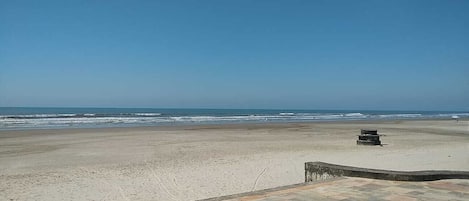 On the beach, sun loungers