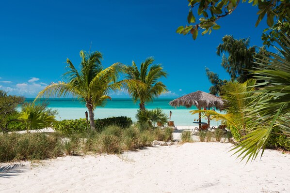 On the beach, sun-loungers, beach towels
