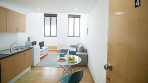 Apartamento, 1 quarto (4) | Área de estar | TV de tela plana