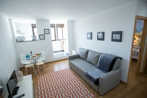 Apartamento, 1 quarto (3) | Área de estar | TV de tela plana