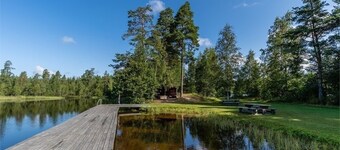 Holiday home in the woods included Rowing boat - lake with jetty   