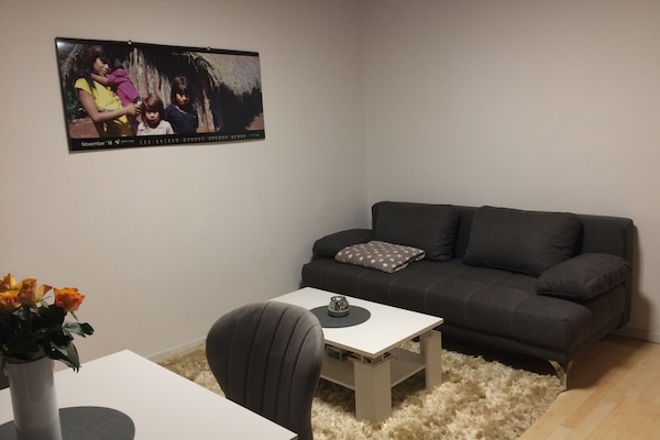 Wohnzimmer mit offene Küche