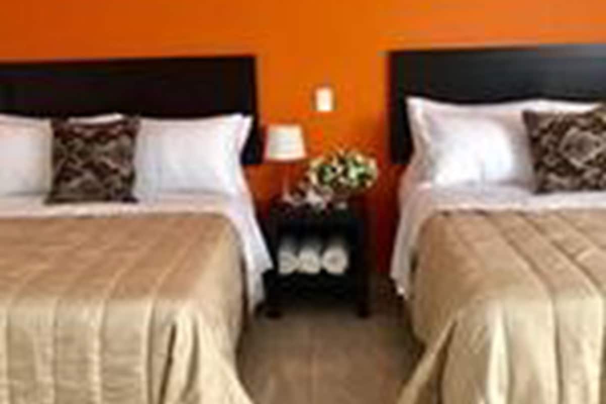 Business Quadruple Room, 2 Queen Beds, Accessible, Non Smoking | Blackout drapes, soundproofing, free WiFi, bed sheets