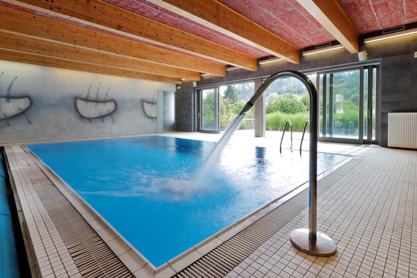 Indoor pool, open 9:00 AM to 8:00 PM, pool umbrellas, sun loungers