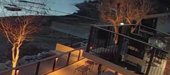 Lakefront Getaway with Dock. Skibakker i sikte fra Spa ved solnedgang.