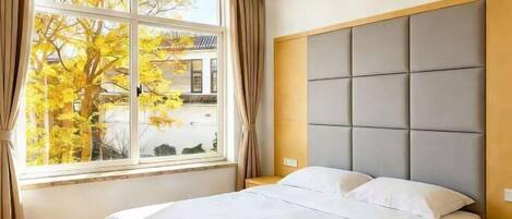 Minibar, desk, blackout drapes, bed sheets