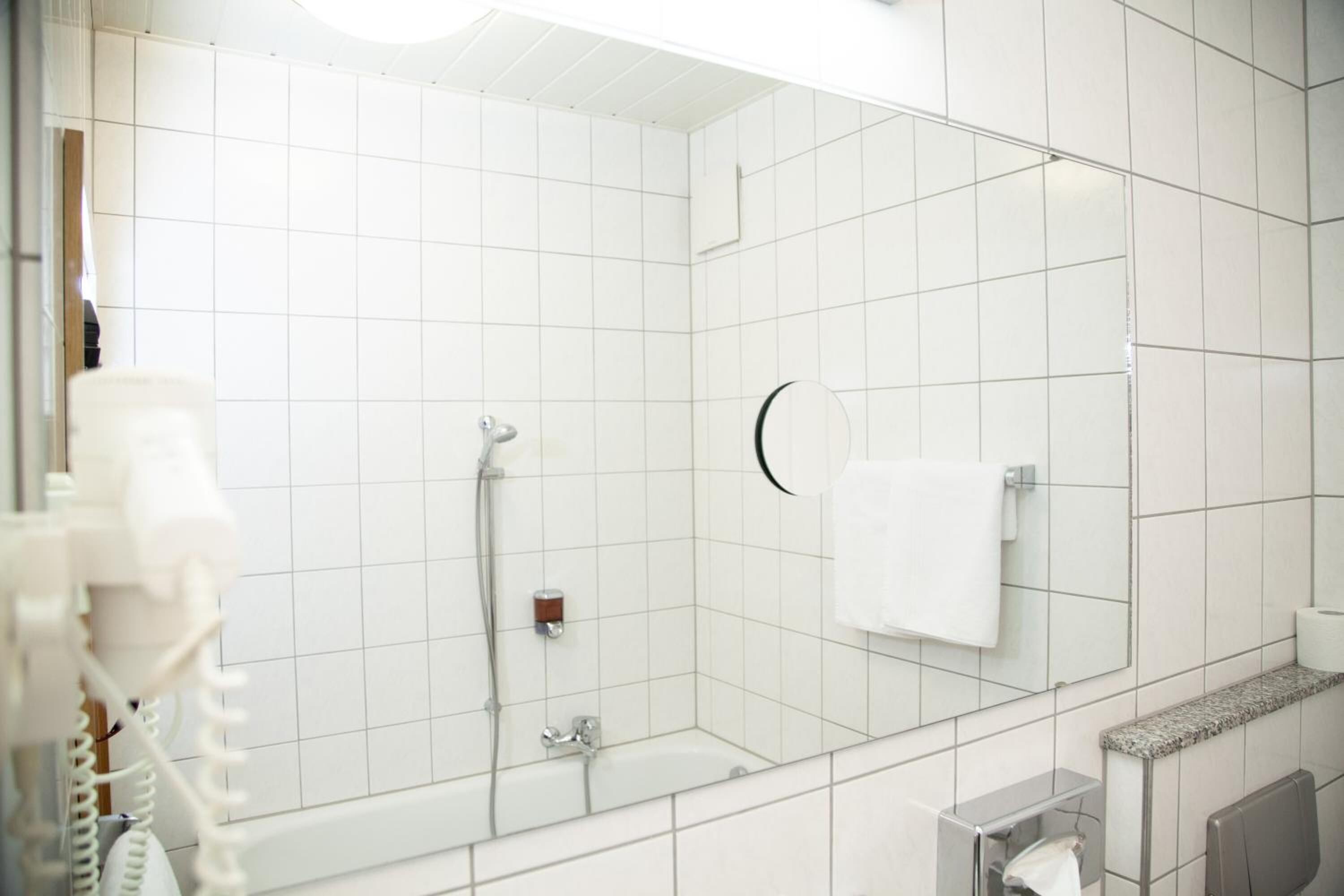 hair dryer, towels, soap, shampoo