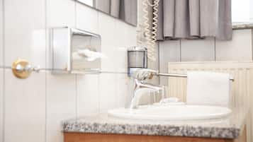 Hair dryer, towels, soap, shampoo