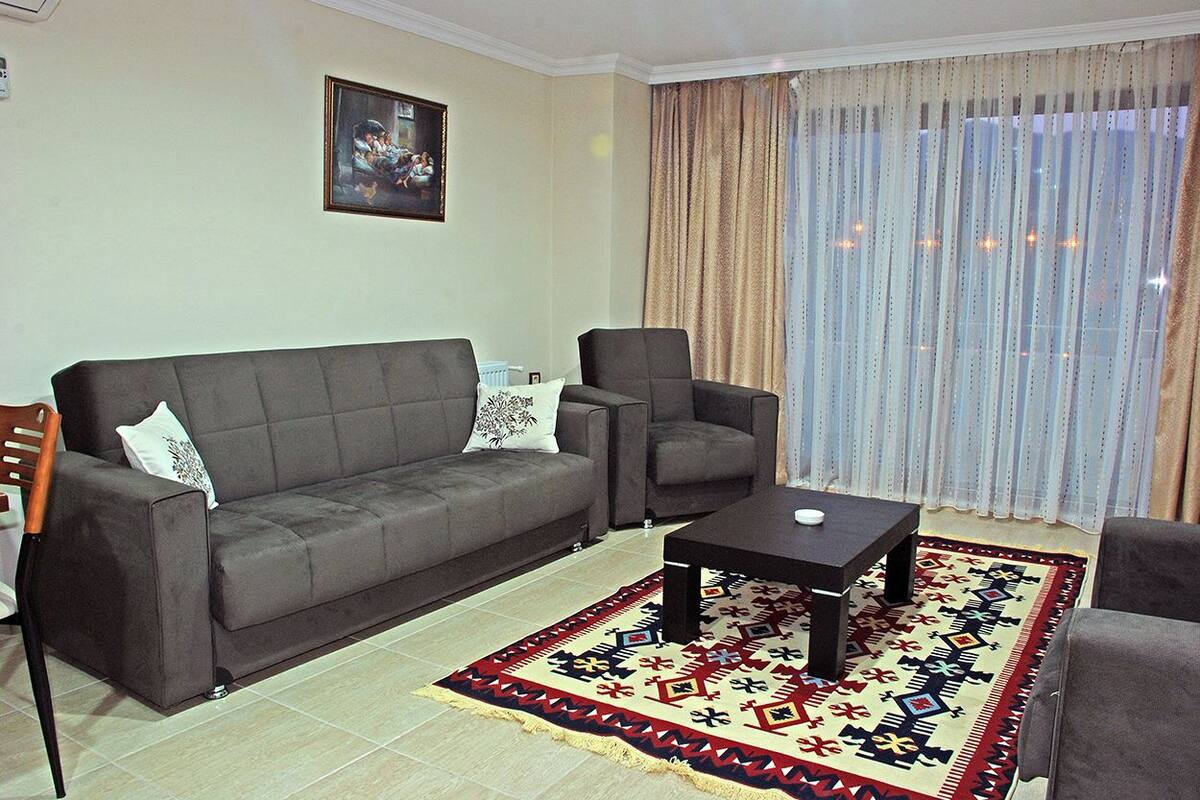 Family Apartment, 1 Double Bed with Sofa bed, Partial Sea View | Living area